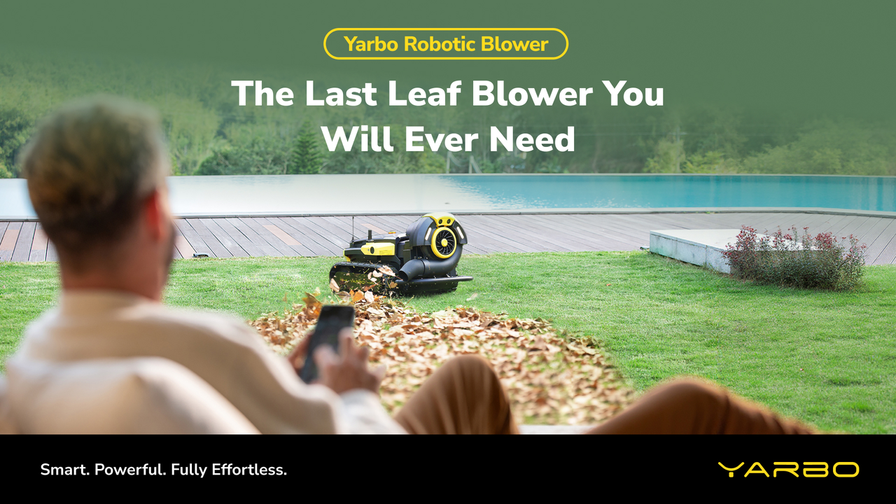 Man relaxes on deck, watching Yarbo robotic blower clear leaves from lawn near pool—smart, effortless yard care.