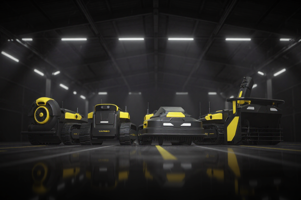 Five sleek Yarbo robotic mowers in black and yellow, lined up in a futuristic warehouse, showcasing advanced yard care innovation.