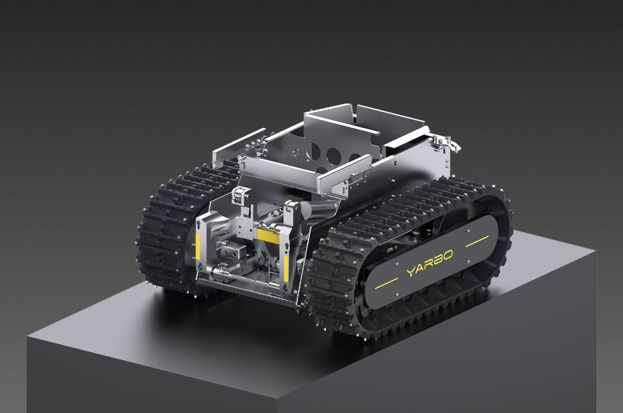 Silver tracked robot with black treads labeled "YARBO" on a gray pedestal, studio lighting.