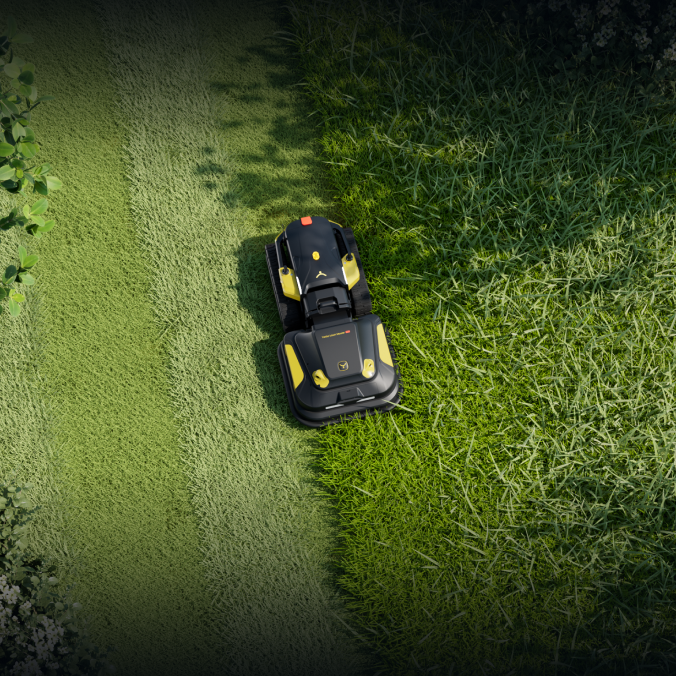 Black and yellow Yarbo robotic mower glides over lush green lawn, cutting grass with precision in a sun-dappled yard.