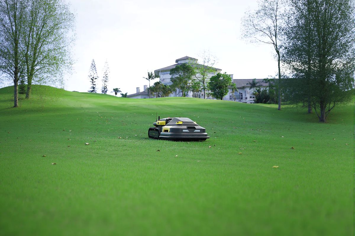 Yarbo robotic mower glides across lush green lawn, powered by RTK GPS for precise, wire-free navigation.