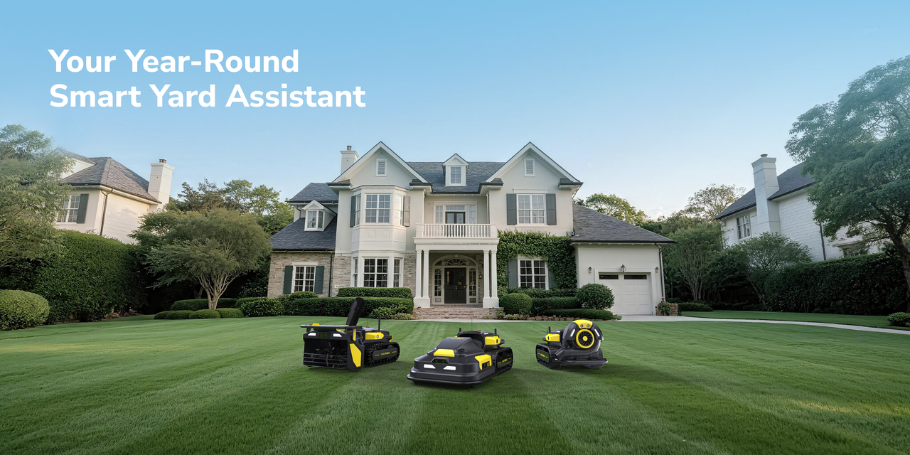 Three Yarbo robotic yard machines on a lush green lawn in front of a large, elegant home under a clear blue sky.