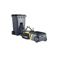 Gray and yellow robotic trash collector with tank treads, pulling a wheeled garbage bin on a white background.