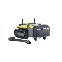 Yellow and black tracked robotic vacuum cleaner with hose attachment, isolated on white background.