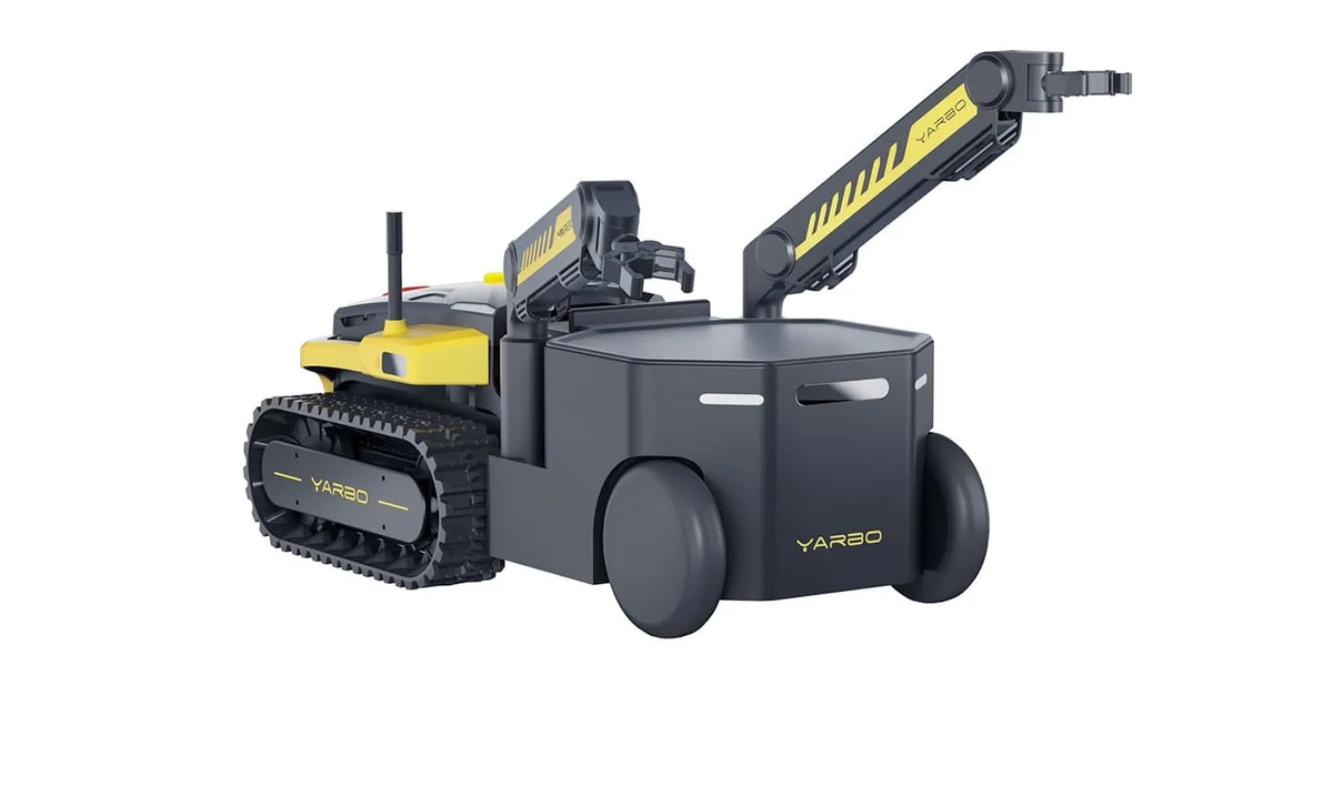 Black and yellow YARBO robotic vehicle with tank tracks and articulated crane arm, isolated on white.