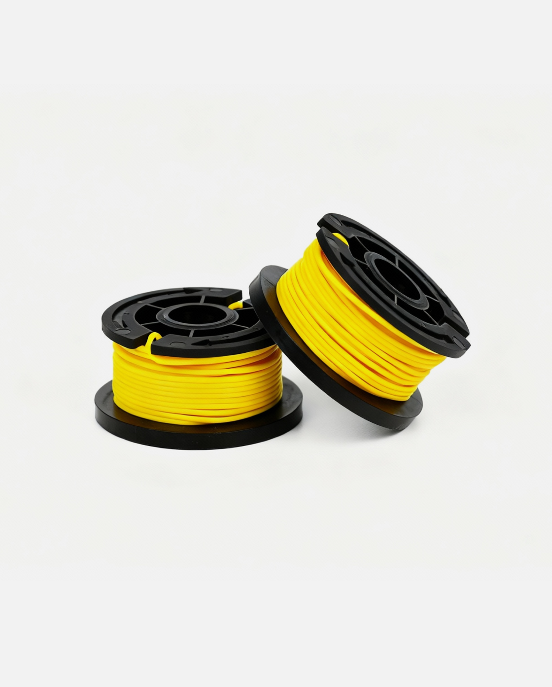 Yellow trimmer line spool with black plastic casing, two spools shown side by side on white background