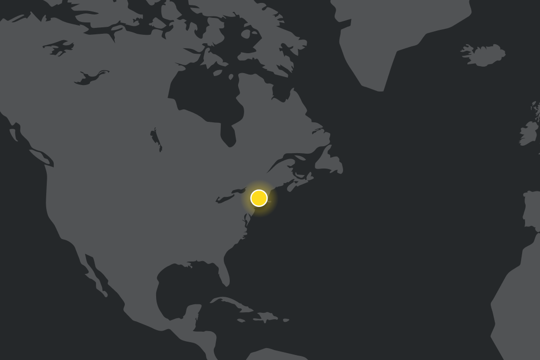 Dark gray map of North America with a glowing yellow circle highlighting the northeastern United States.