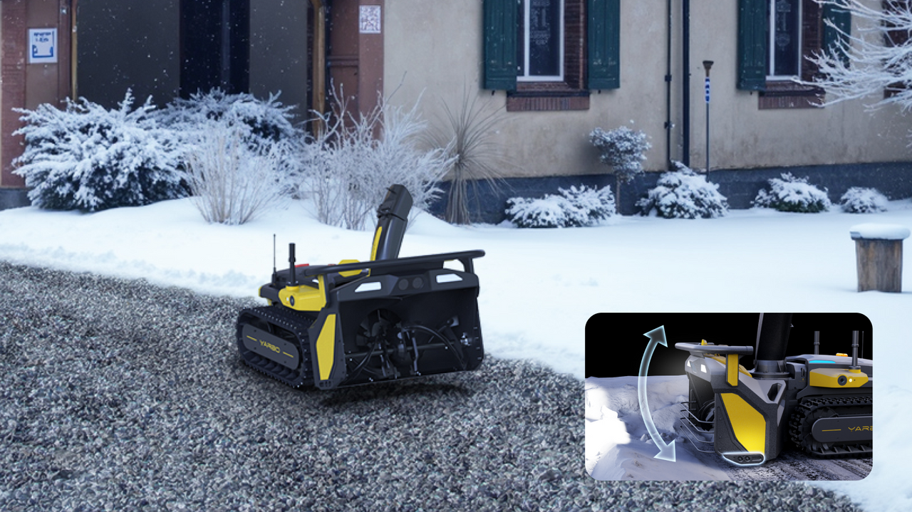 Black and yellow YARD robot snow blower on gravel path, clearing snow near house; inset shows adjustable chute.