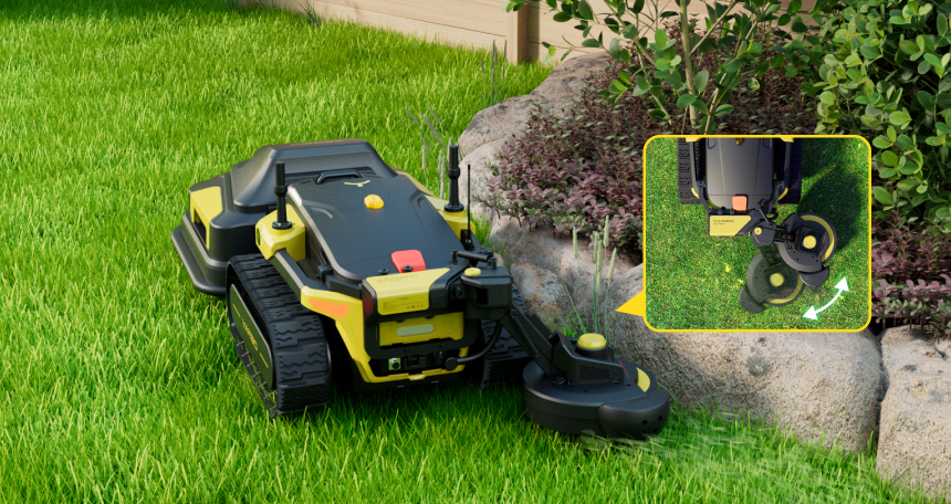 Yellow and black robotic lawn mower on green grass near rocks and shrubs, inset shows cutting blades in motion.