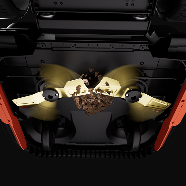 Top-down view of a black and orange coffee grinder with gold blades actively crushing dark coffee beans.