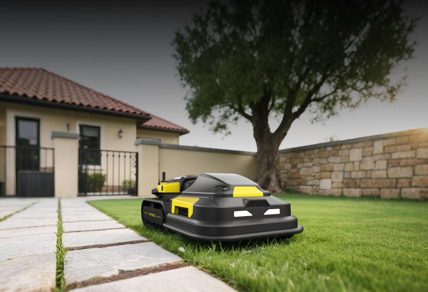Black and yellow robotic lawn mower on green grass near stone path, with house and tree in background.