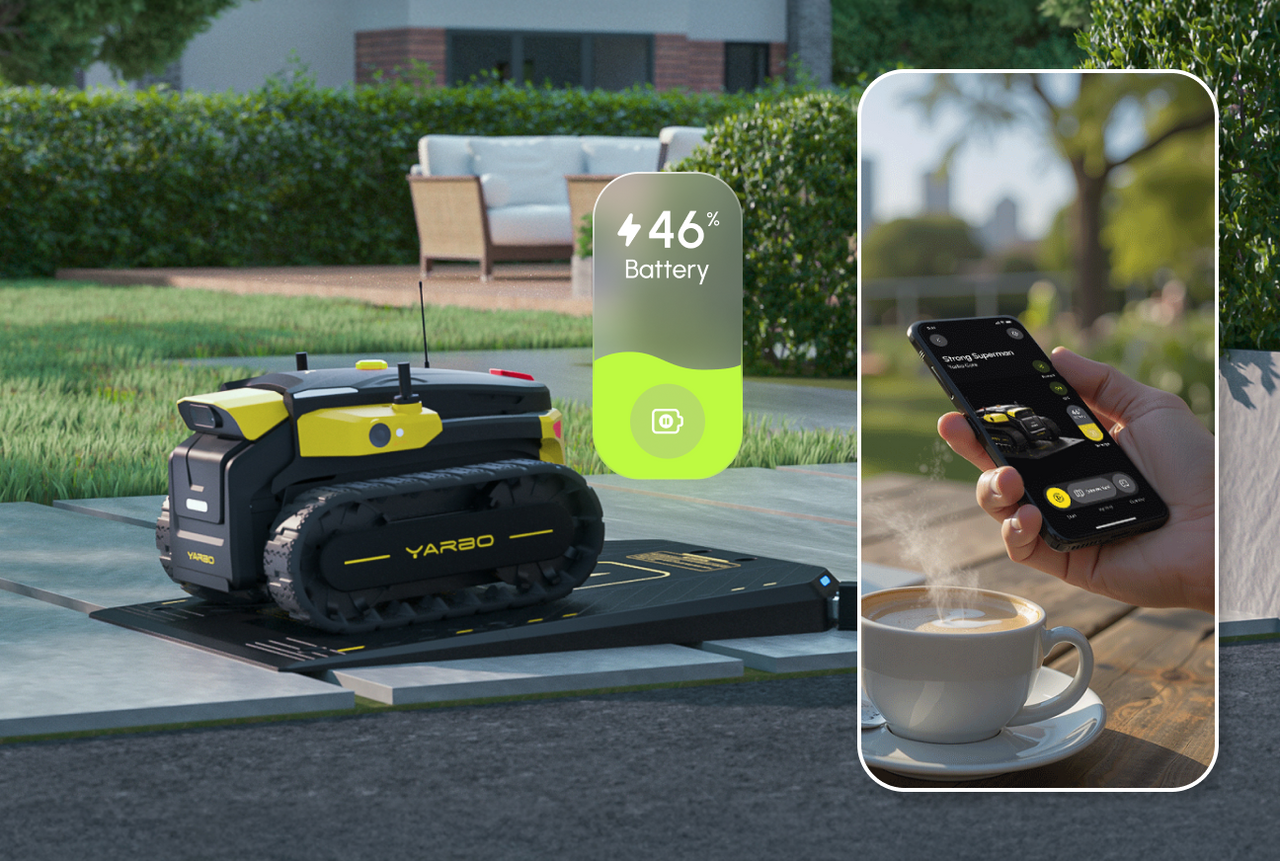 Black and yellow YARBO robotic lawn mower on charging pad, 46% battery shown, with inset of hand holding phone controlling mower, coffee cup nearby.