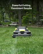 Black and yellow robotic lawn mower by Yarbo on green grass, front view, outdoor setting