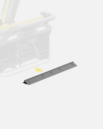 Gray metal scraper bar with bolt holes, shown in front view, for Y Series equipment, with faded machinery background and yellow arrow indicator.