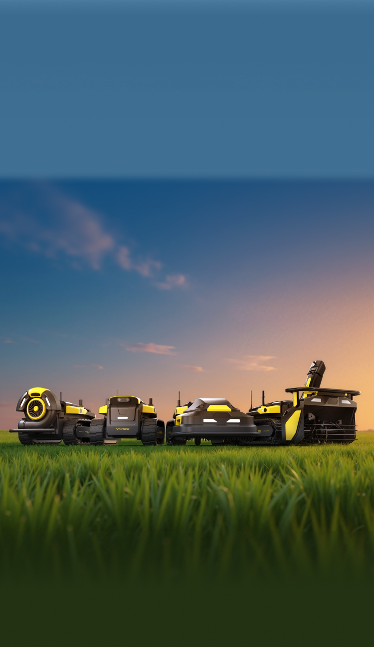Four black and yellow autonomous farming robots lined up in a green field under a twilight sky.