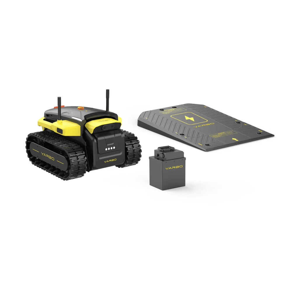 Black and yellow YARBO robotic lawn mower with tracks, charging station, and battery pack on white background.
