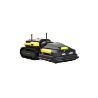 Black and yellow remote-controlled robot with tank treads and front bumper, featuring antennas and "V2PRO" branding on side.