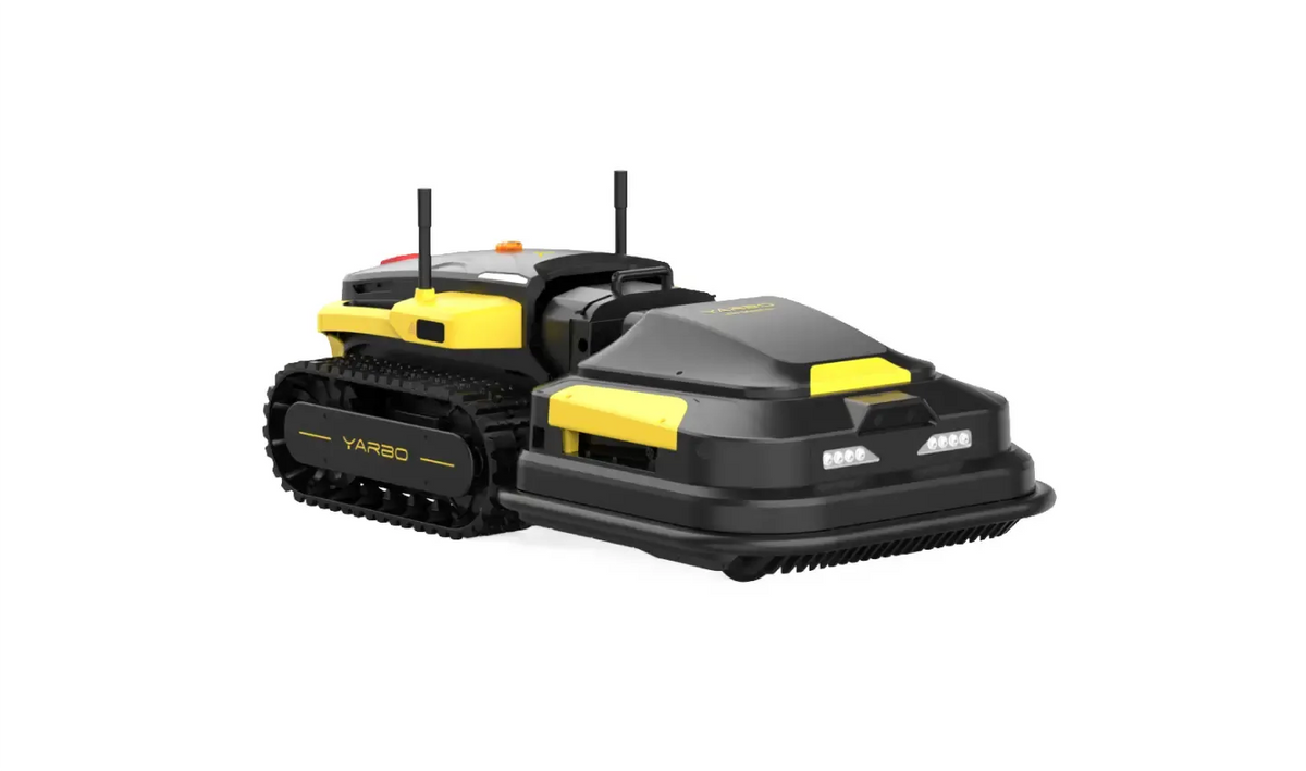Black and yellow YARBO robotic lawn mower with tank tracks, front lights, and antennas on white background.